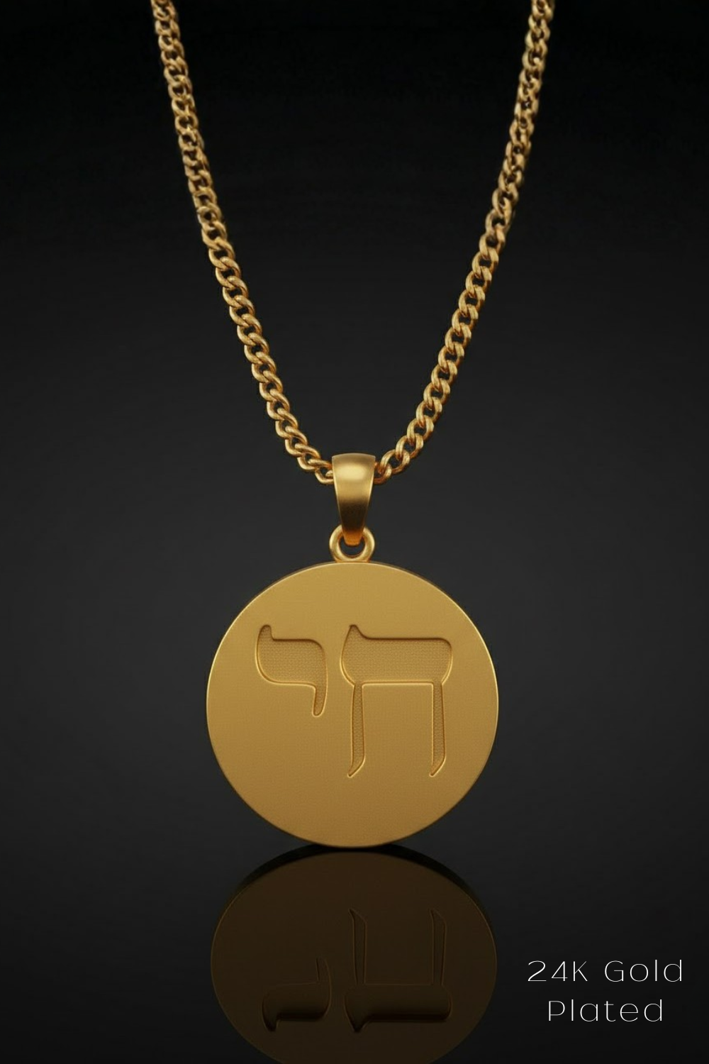 A 24K gold plated pendant necklace with a circular medallion featuring a symbol.