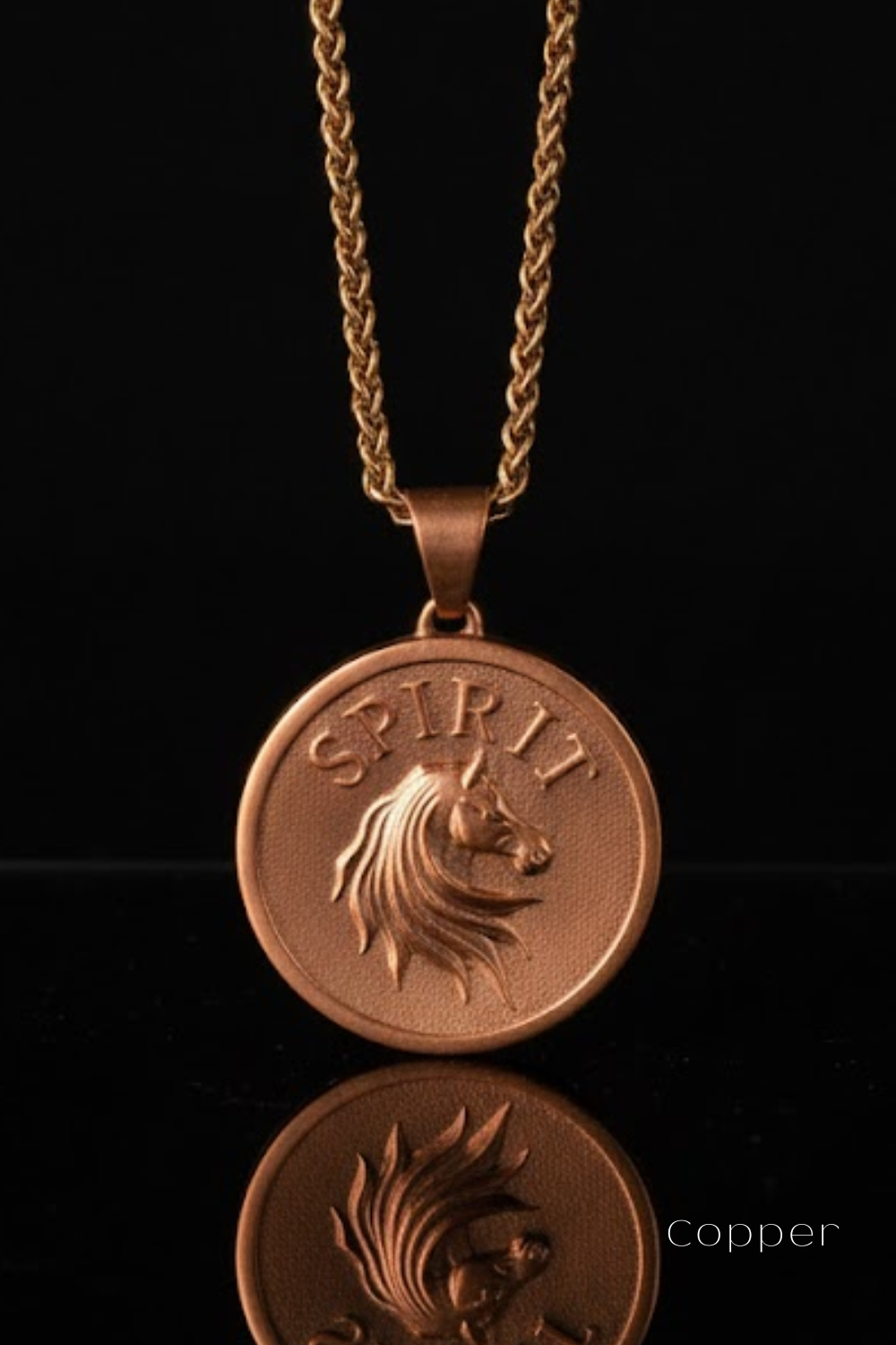 A copper-colored pendant necklace with a circular medallion featuring a horse's head design.
