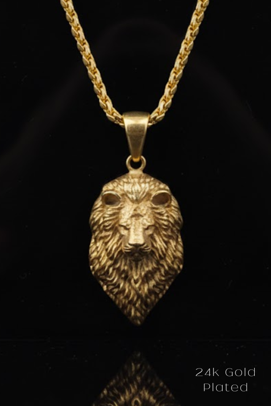 A 24k gold-plated pendant featuring a detailed lion's head design.