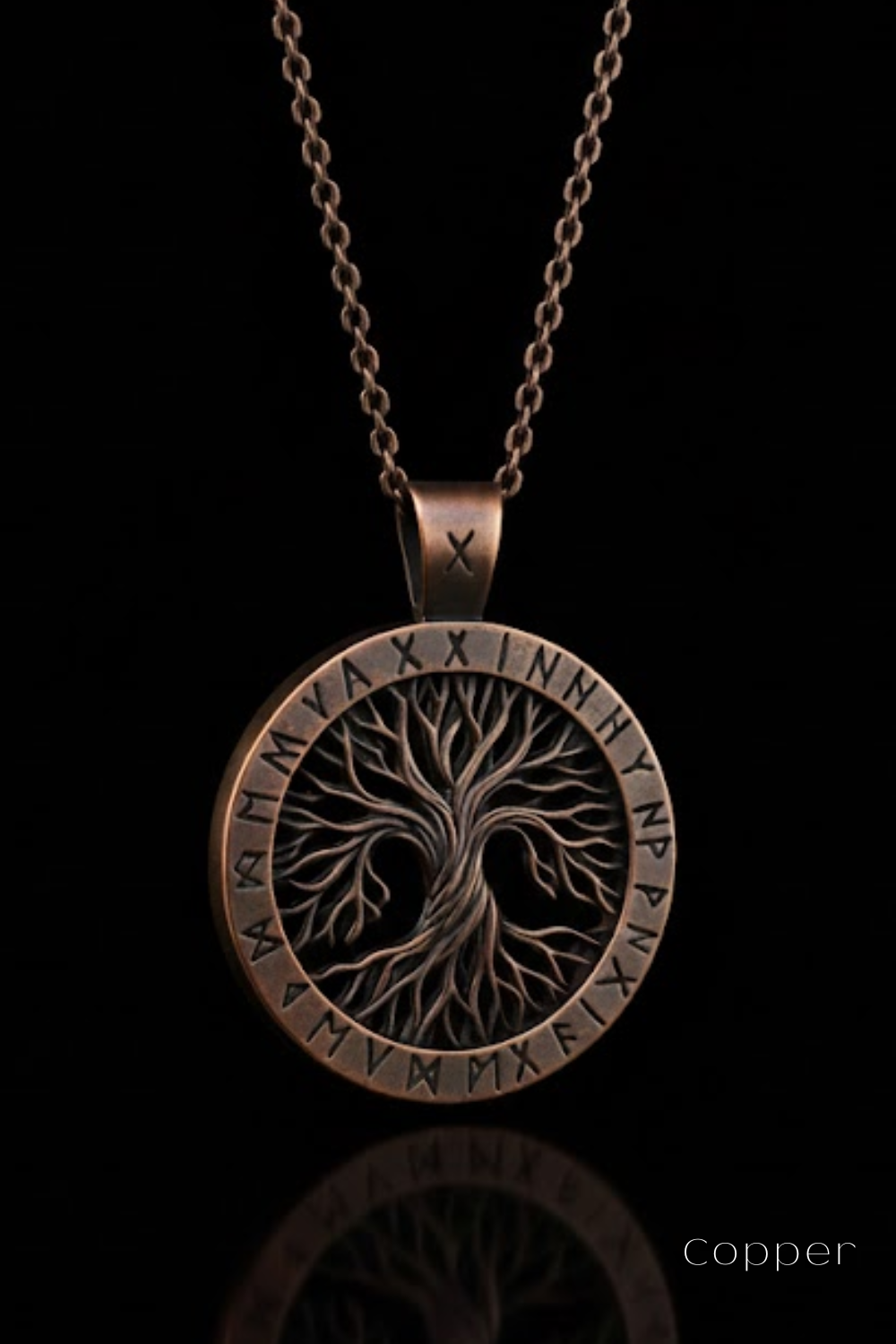 A copper-colored pendant necklace with a circular design featuring a tree-like motif and various symbols.