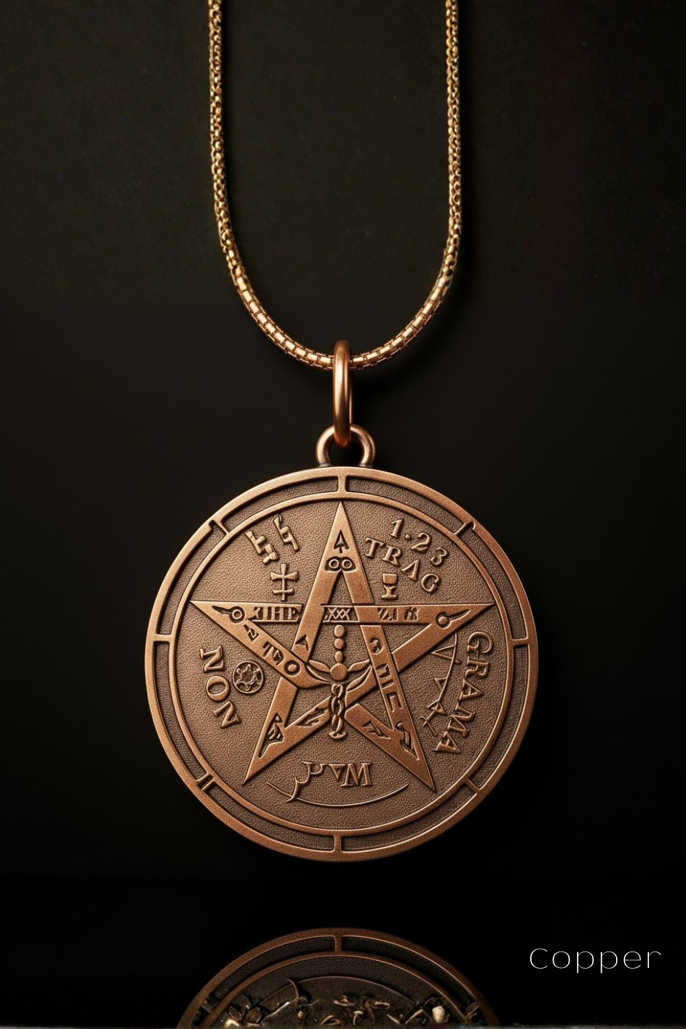 A copper-colored pendant necklace with a circular medallion featuring a pentagram design and various symbols and text.