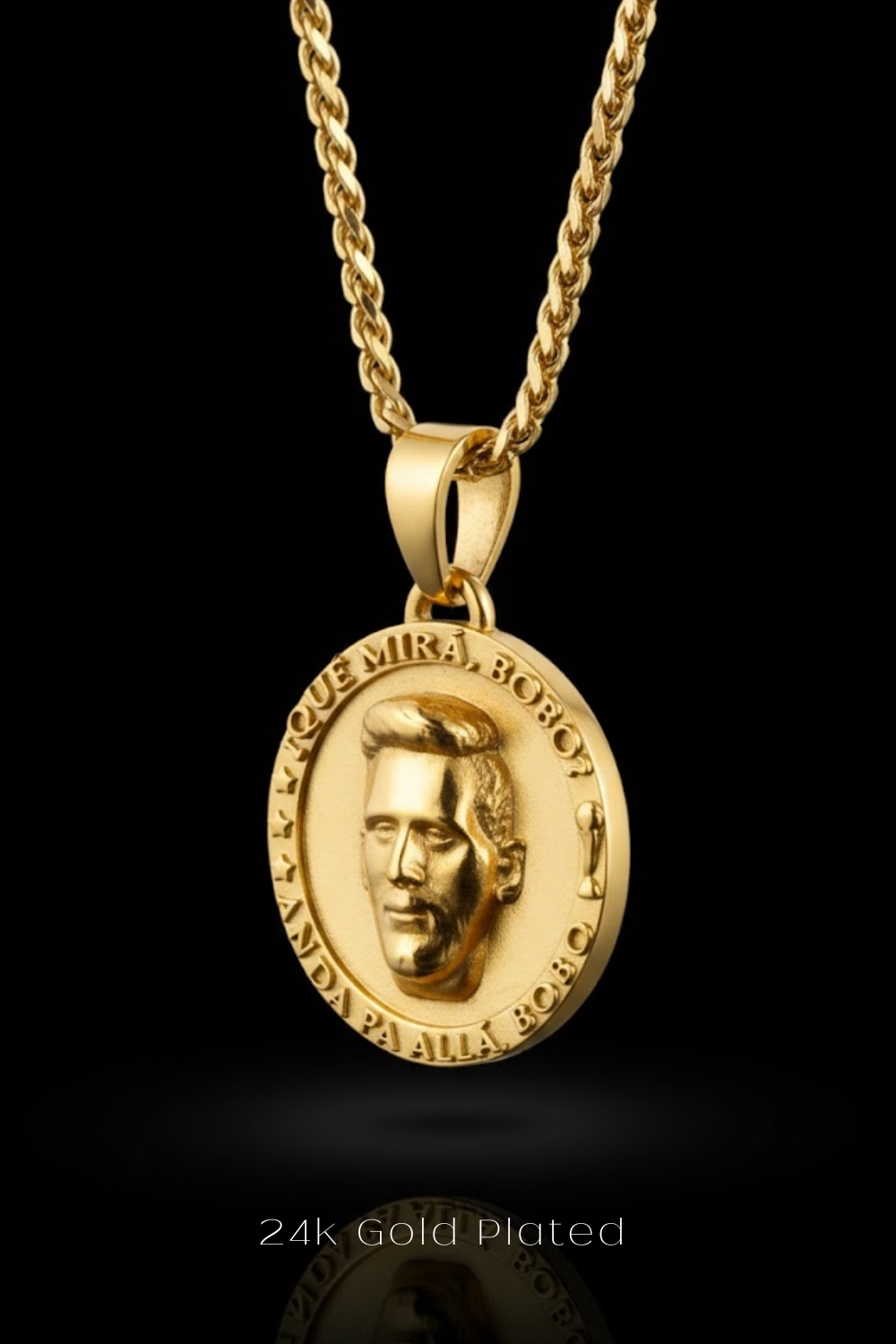 A 24k gold plated pendant featuring a close-up of a man's face on a circular medallion.