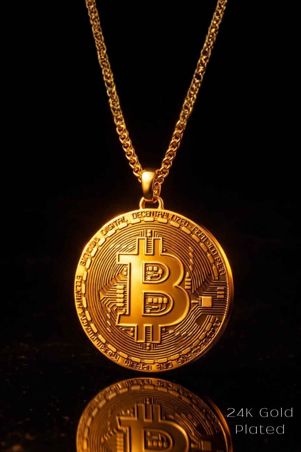 A 24K gold-plated pendant necklace with a large, intricate Bitcoin symbol design.