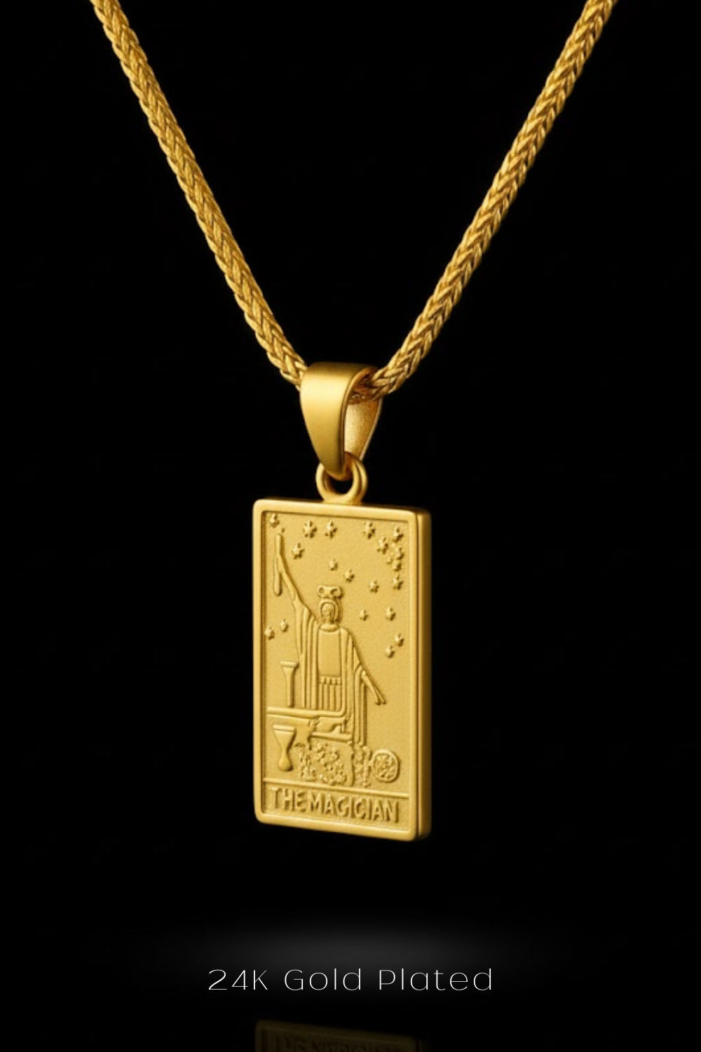 A 24k gold-plated pendant necklace with a rectangular pendant featuring an illustration of a wizard.