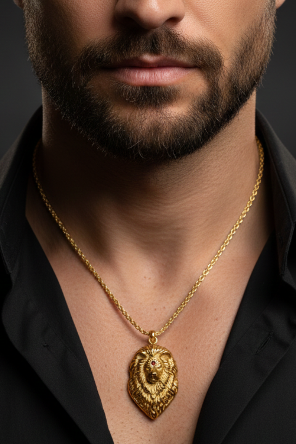 A close-up of a man's neck and chest area, with a gold-colored pendant necklace featuring a lion's head design.