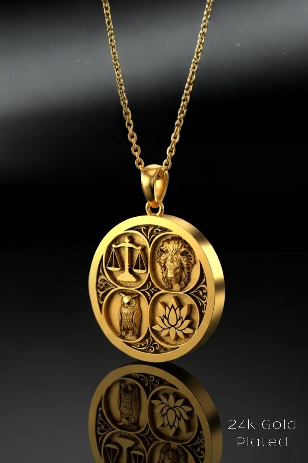A gold-plated pendant necklace with a circular design featuring four distinct symbols: a scale, an owl, a lotus flower, and a lion.