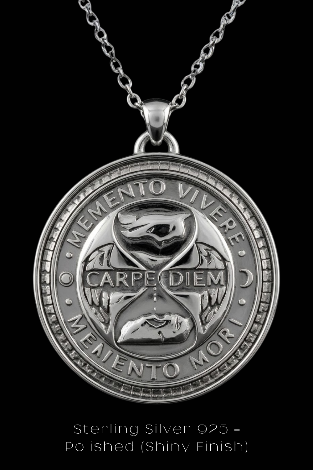 A silver pendant necklace with a circular medallion featuring the Latin motto "Memento Vivere" and the words "Carpe Diem" and "Memento mori" engraved on it.