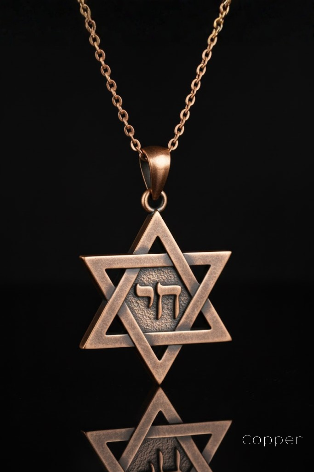 A copper-colored pendant necklace with a Star of David pendant, which is a symbol associated with Judaism and the Jewish faith.