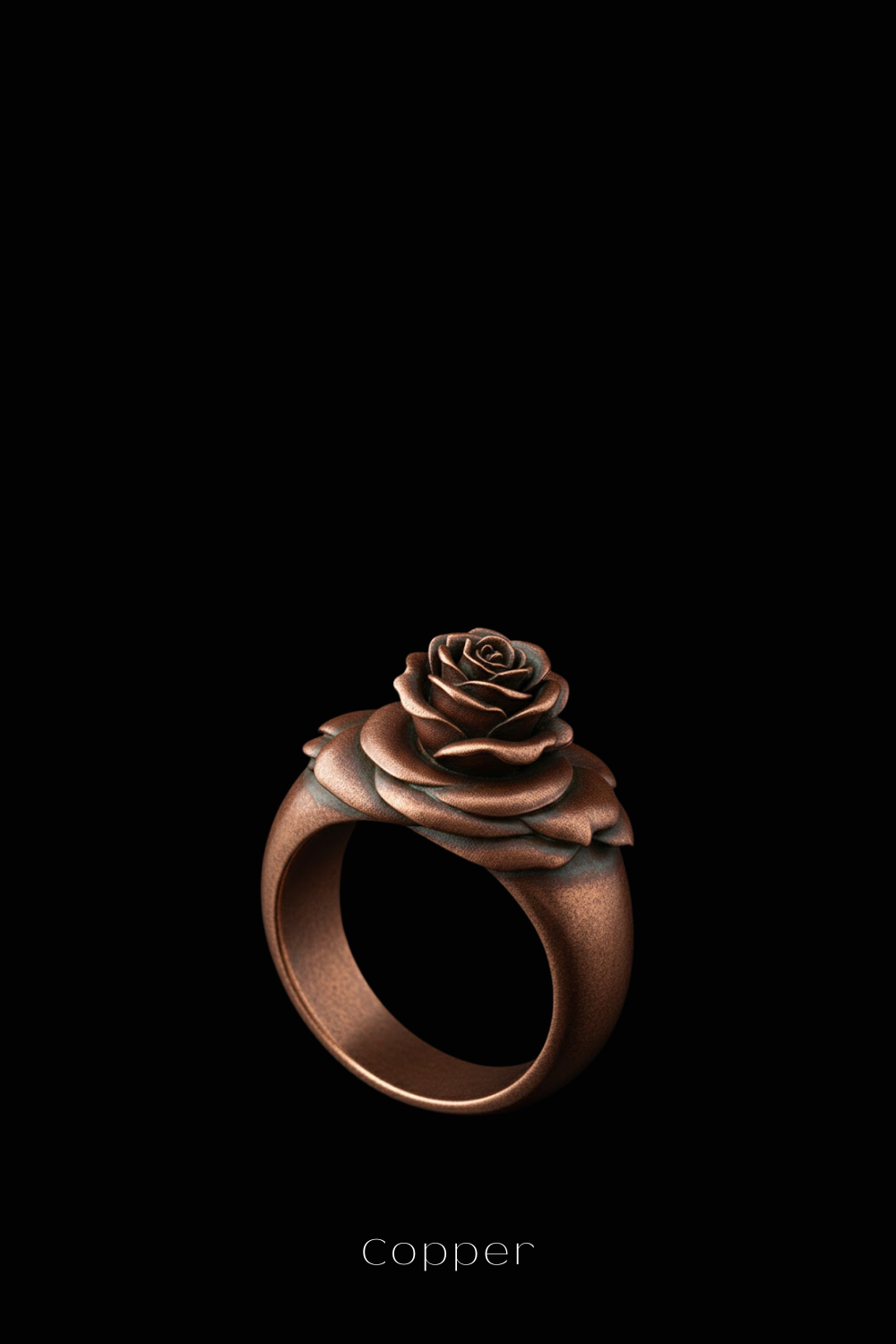 A copper-colored rose ring against a black background.