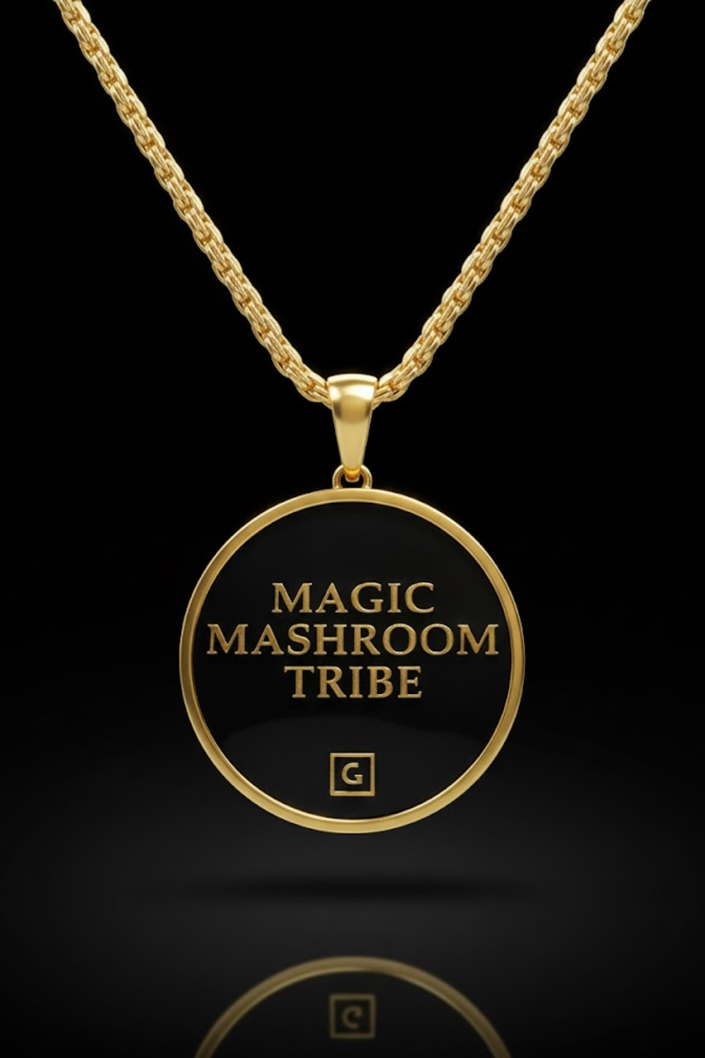 A gold-colored pendant necklace with a circular medallion featuring the text "MAGIC MASHROOM TRIBE" in gold lettering.