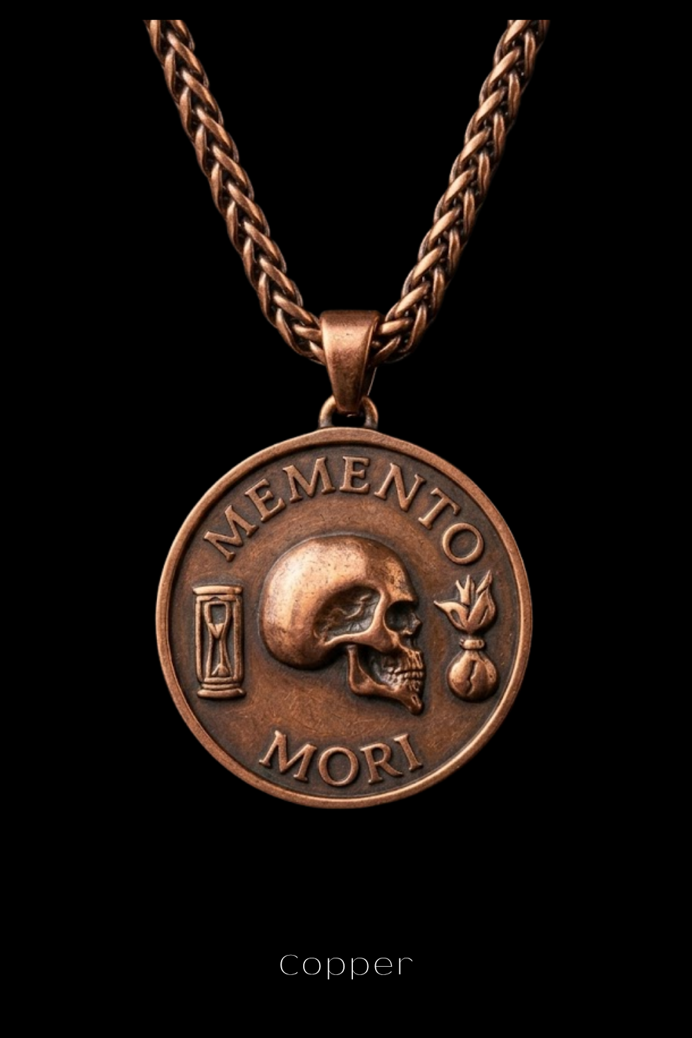 a copper-colored pendant necklace with a circular medallion featuring a skull and the Latin phrase "Memento mori" (which means " remembrance of death ").