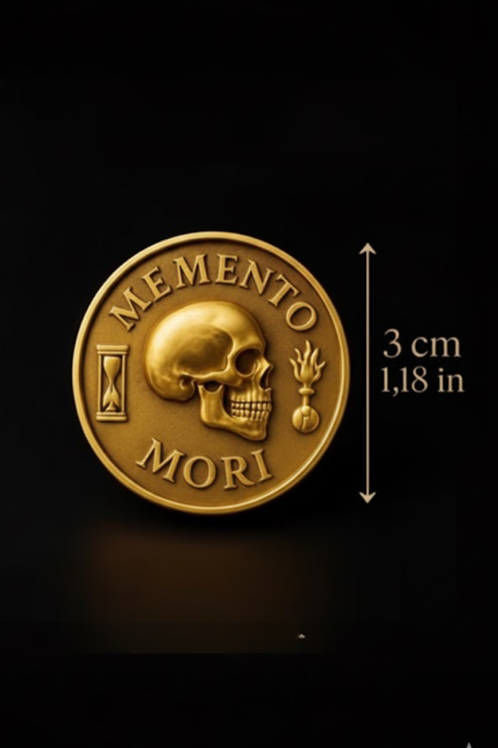 The image is a gold-colored coin with the text "MEMENTO MORI" and a skull symbol, along with a small flame. The coin is shown against a black background, and there is a measurement scale indicating its size.