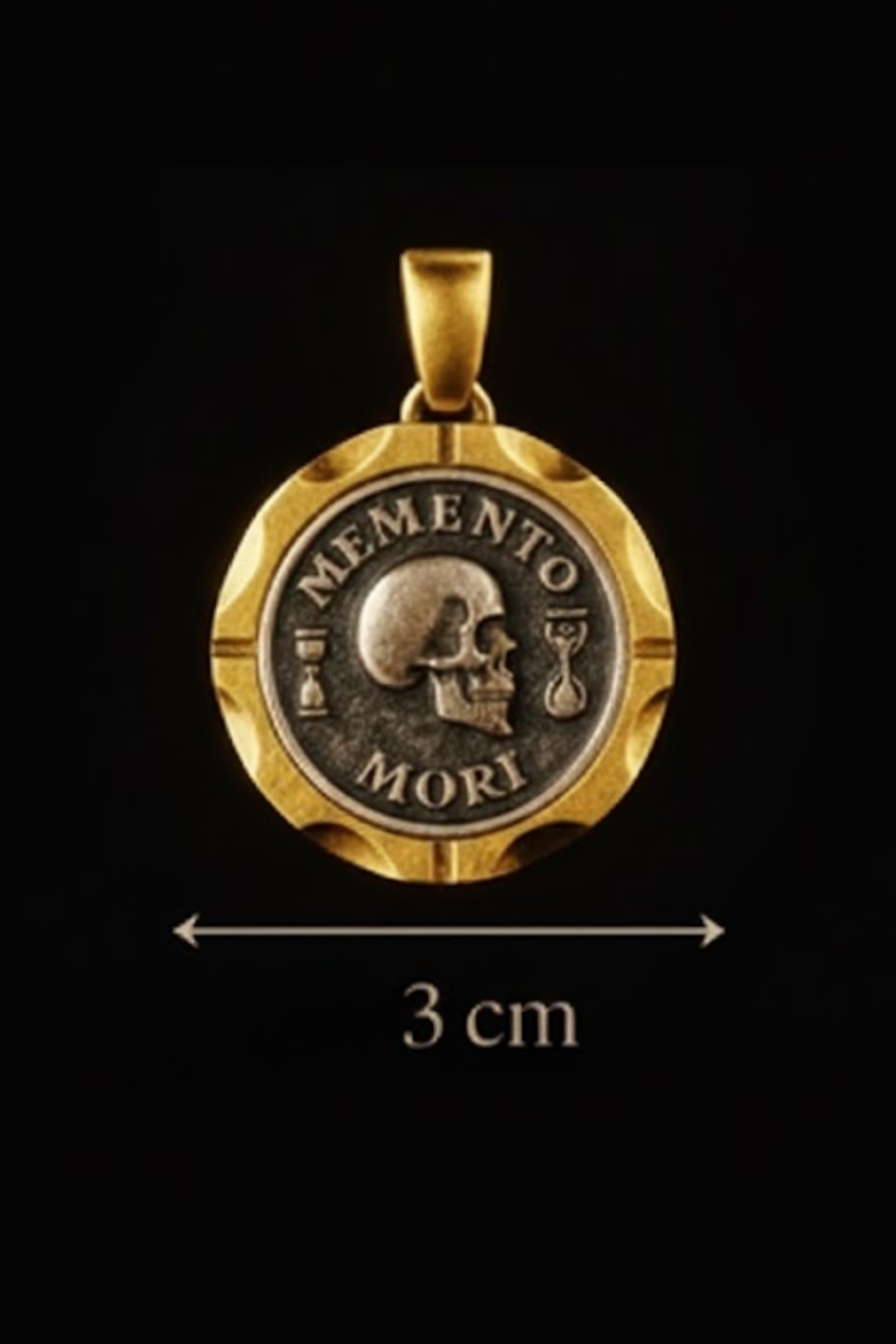 A gold-colored pendant with a skull and the words "MEMENTO MORT" engraved on it, against a black background.