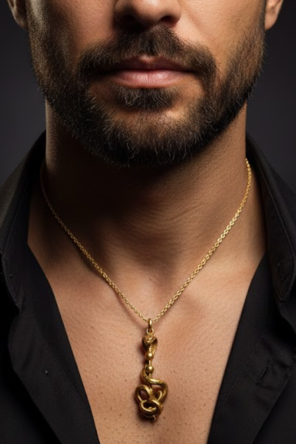 A close-up of a man's neck and chest area, with a gold necklace featuring a pendant hanging from the man's neck.