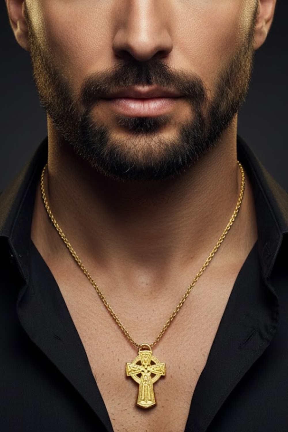 A close-up of a man's neck and chest area, with a gold cross pendant hanging from a gold chain.