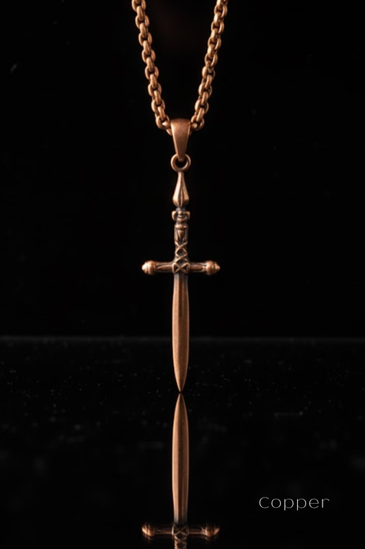 A copper-colored pendant necklace with a cross-shaped sword pendant is displayed against a black background.