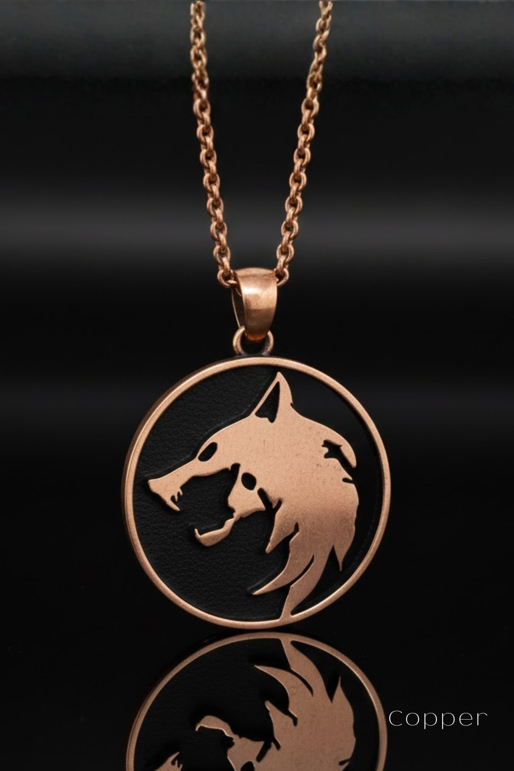 A copper-colored pendant necklace with a circular pendant featuring a stylized wolf or wolf-like creature design.