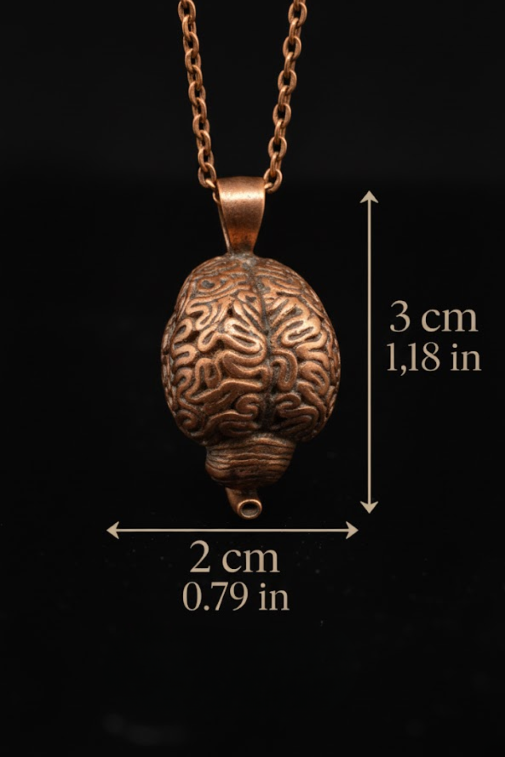 A copper-colored pendant in the shape of a brain, measuring 3 cm in length.