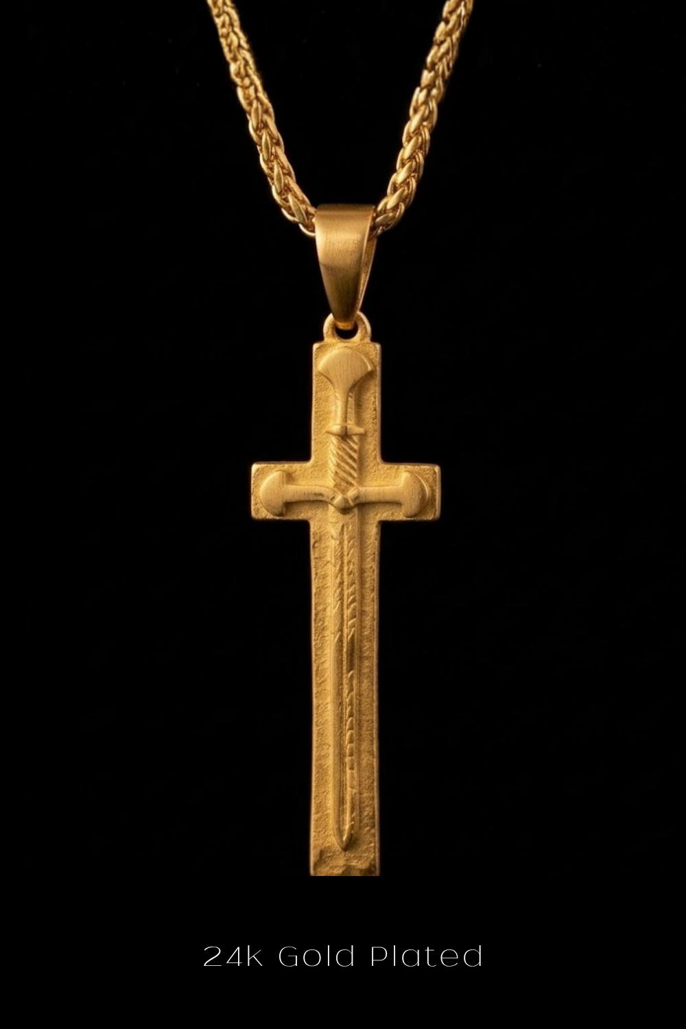 A 24k gold-plated pendant featuring a cross design on a chain against a black background.