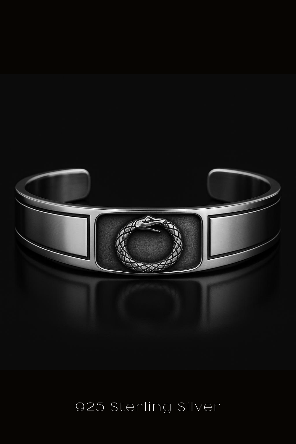 A silver bracelet with a snake design on the front, set against a black background.