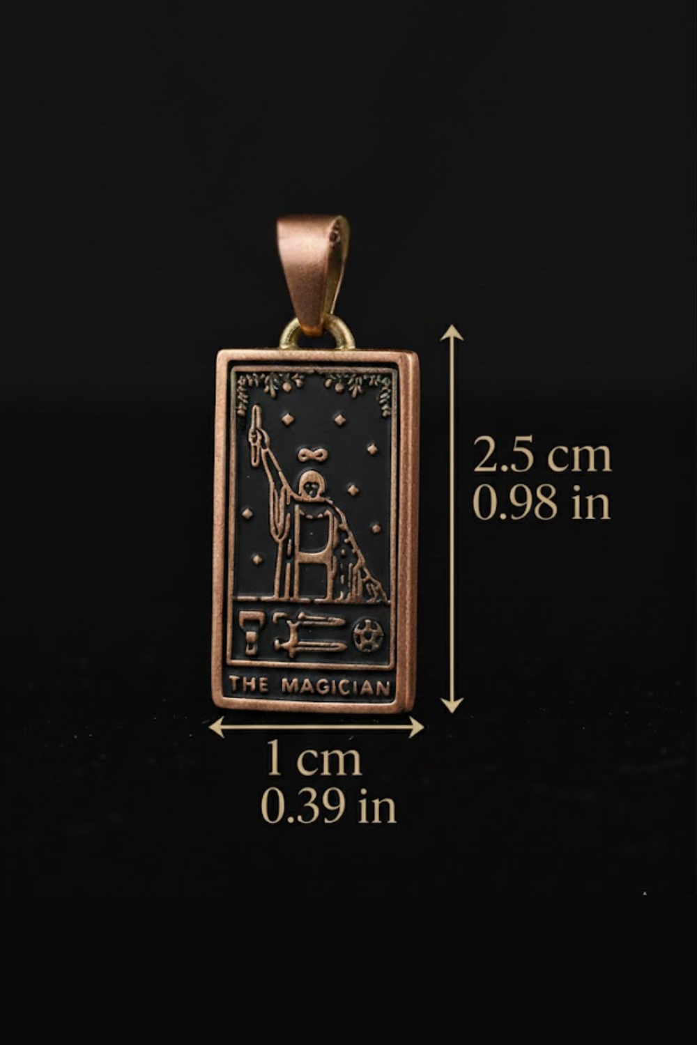 A pendant in the shape of a tarot card, specifically the "The Magician" card, with measurements provided.