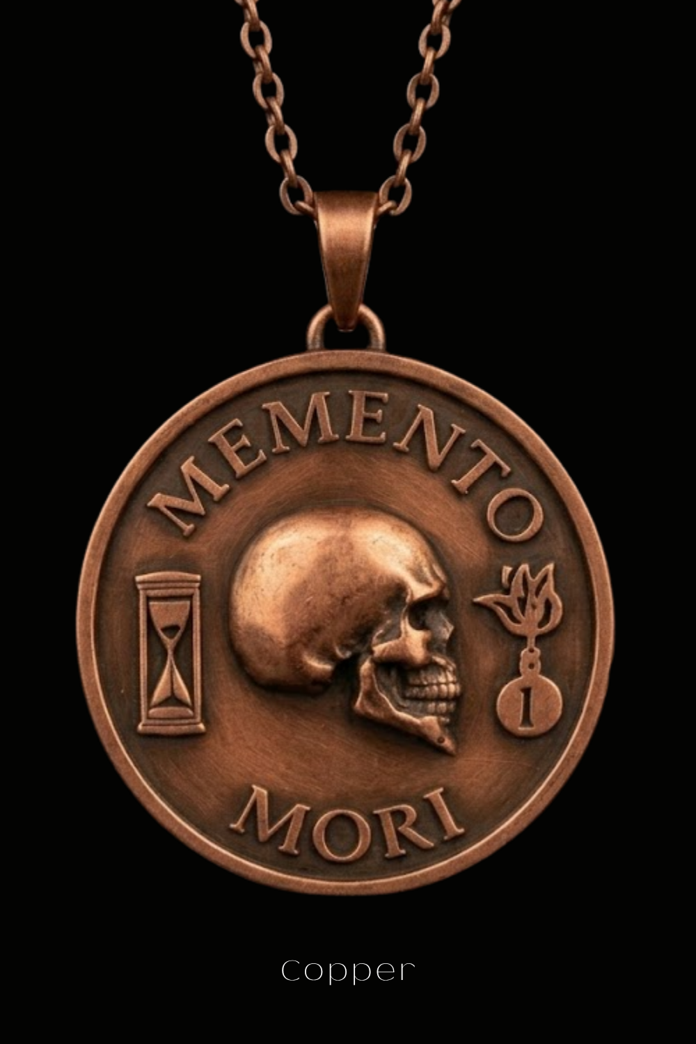 A copper-colored pendant necklace with a circular medallion featuring a skull and the Latin phrase "Memento mori" (The Memory of Death).