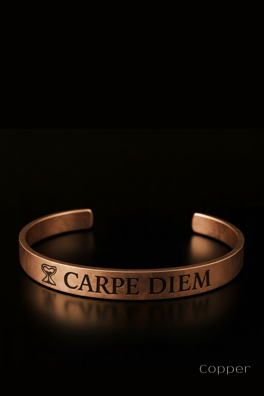 A copper-colored bracelet with the text "CARPE DIEM" engraved on it, which means "Carpe Diem" in Latin.