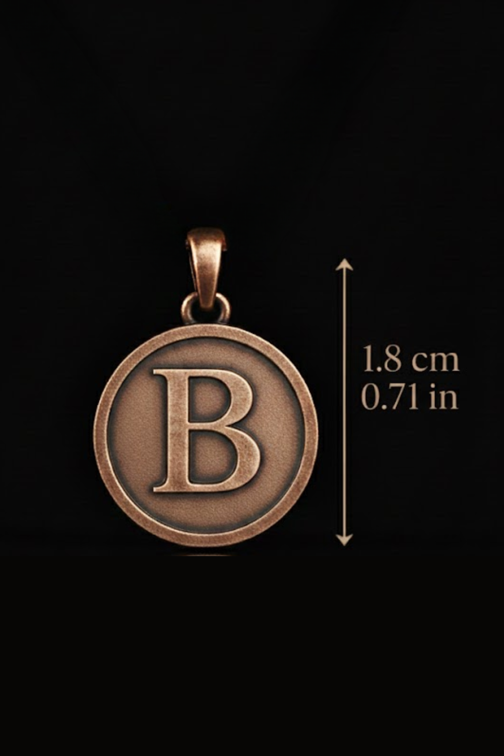 A close-up image of a large, round pendant featuring the letter 'B' in a metallic, copper-colored design.