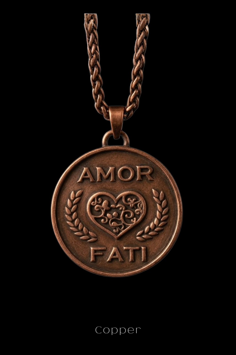 A copper-colored pendant necklace with a heart-shaped medallion featuring the words "Amor Fati" engraved on it.