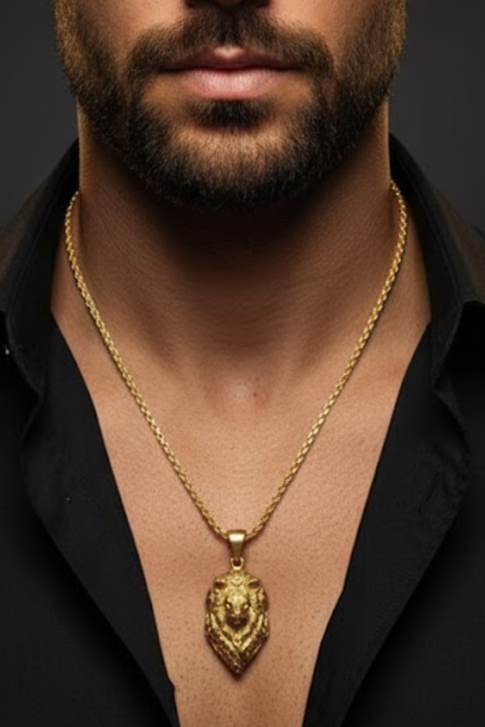 A close-up of a man's neck and chest area, with a gold chain necklace featuring a pendant hanging from the man's neck.